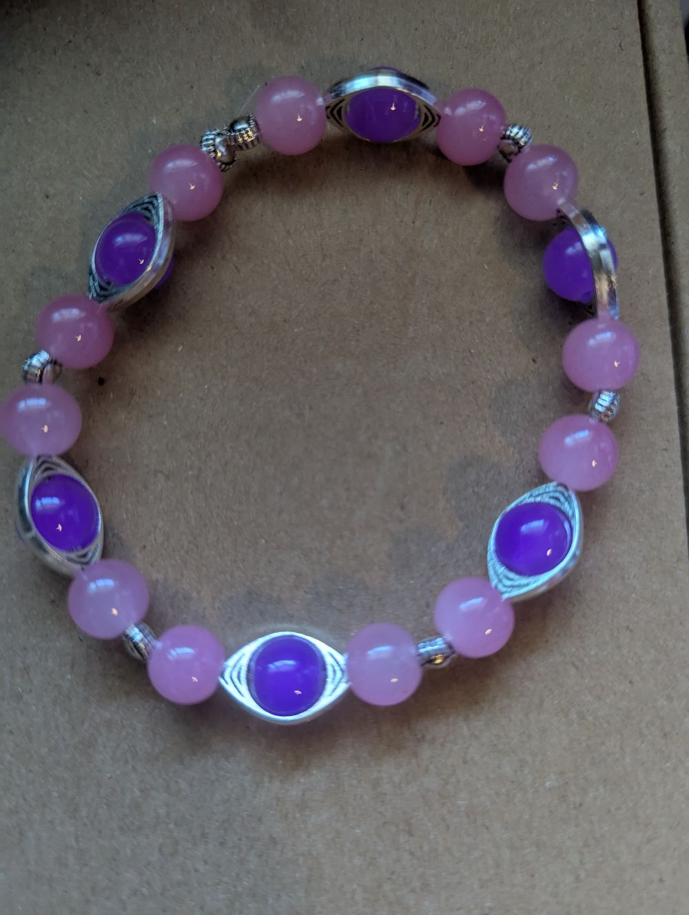 Pink n purple eye bracelet 