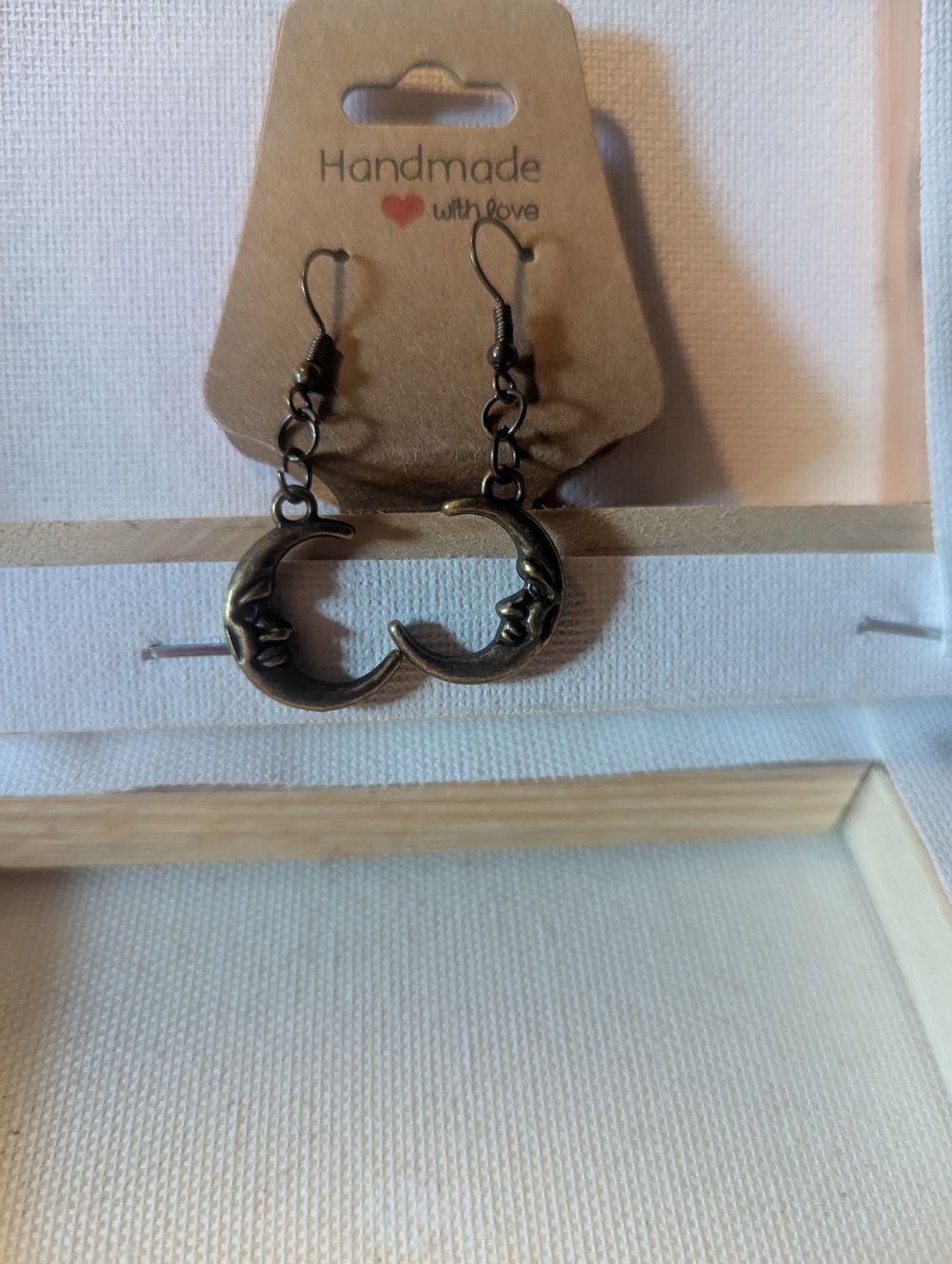Brassy finish moon earrings 